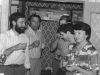 Farewell party of  Alexander and Lora Genusov family at their apartment. From the left: Daniel Romanovsky, father of Lora Genusov, Alexander and Lora Genusov. Leningrad, 1981. co RS