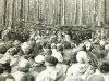 3rd Jewish SongFestival. One can see a small part of the clearing, the sukkah, the audience and the performance of the childrens chorus. Mila Kaganov was the chorus director. She is standing among the children, at the microphone. Moscow, Ovrazhki forest, Succot, 1980, co RS