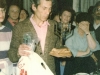 Farewell party for Israeli delegation at Kholmiansky apt.  Moscow, September 10, 1985. Igor Gurvich with present from the delegation